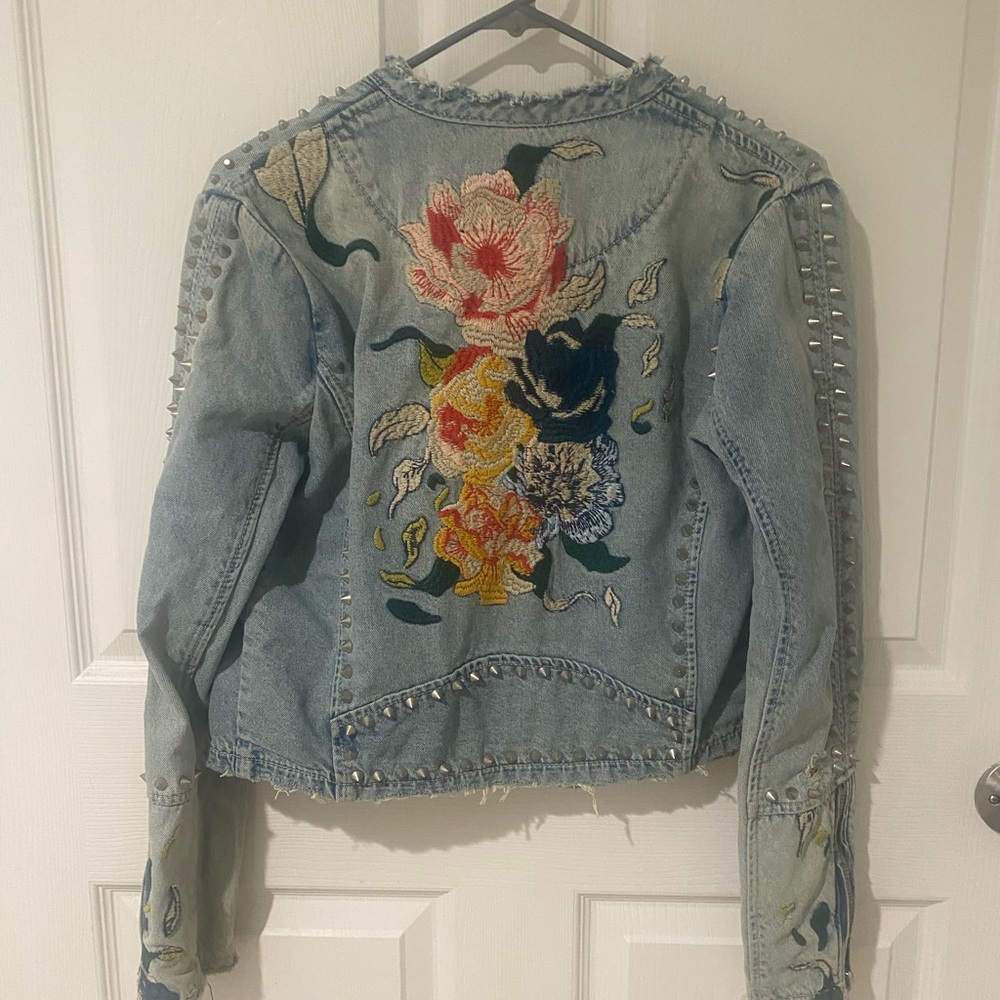 Women's Small Blank NYC cropped, embroidered, and studded denim jacket.